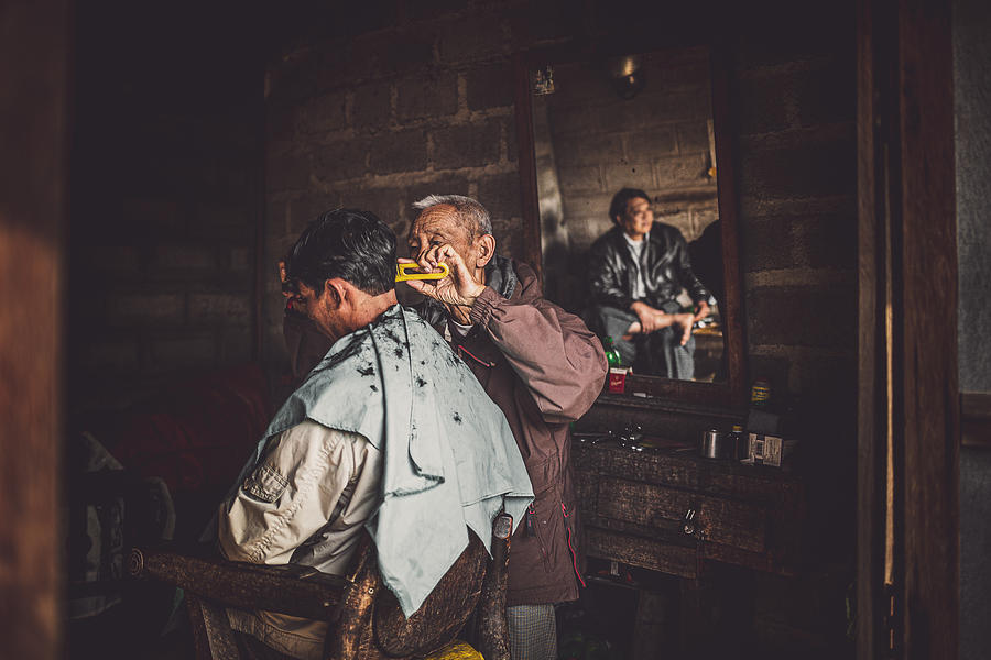 Barber Of Inle Lake Photograph by Marco Tagliarino