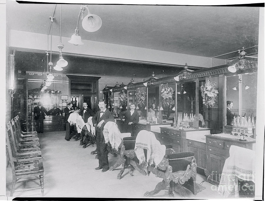 Barbers Working On Clients Photograph by Bettmann