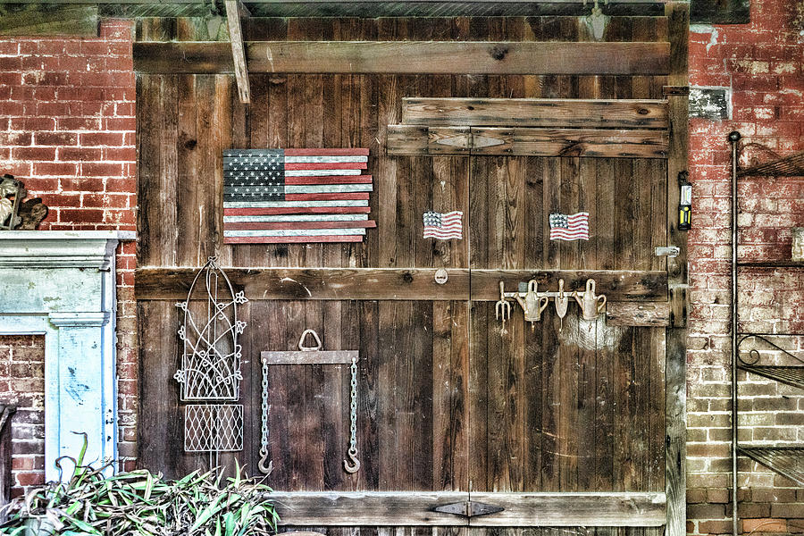 Barn Door with Flags Photograph by Sharon Popek