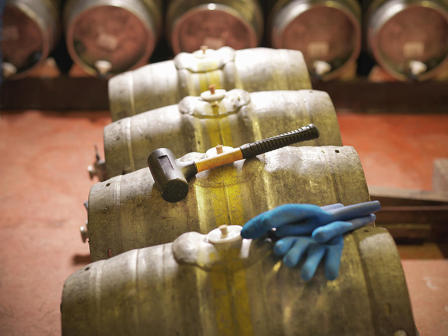 Barrels And Hammer In Brewery Photograph by Monty Rakusen