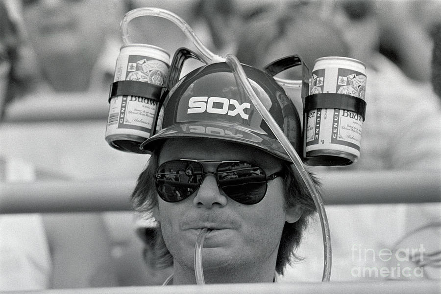Baseball Fan Wearing Double Beer Hat Photograph by Bettmann