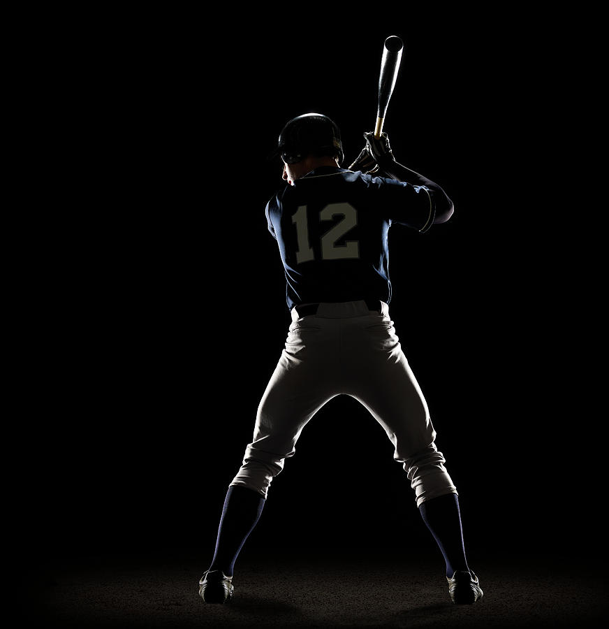 Baseball Player Preparing To Swing Bat Photograph by Lewis Mulatero