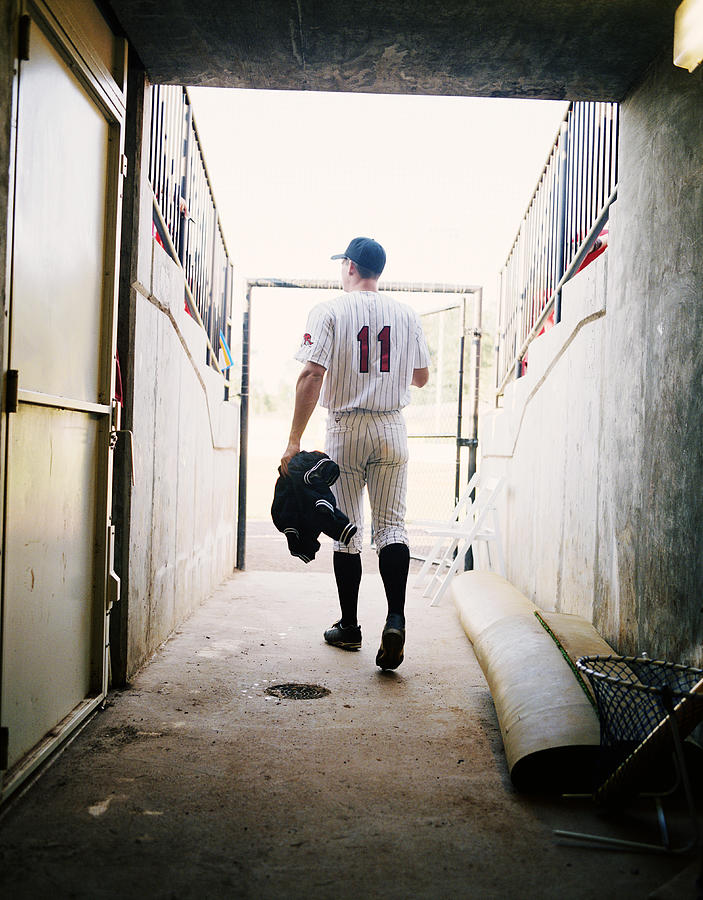 Baseball Player Walking Through Stadium Photograph by Jim Bastardo Baseball Player Walking Through Stadium Photograph by Jim Bastardo