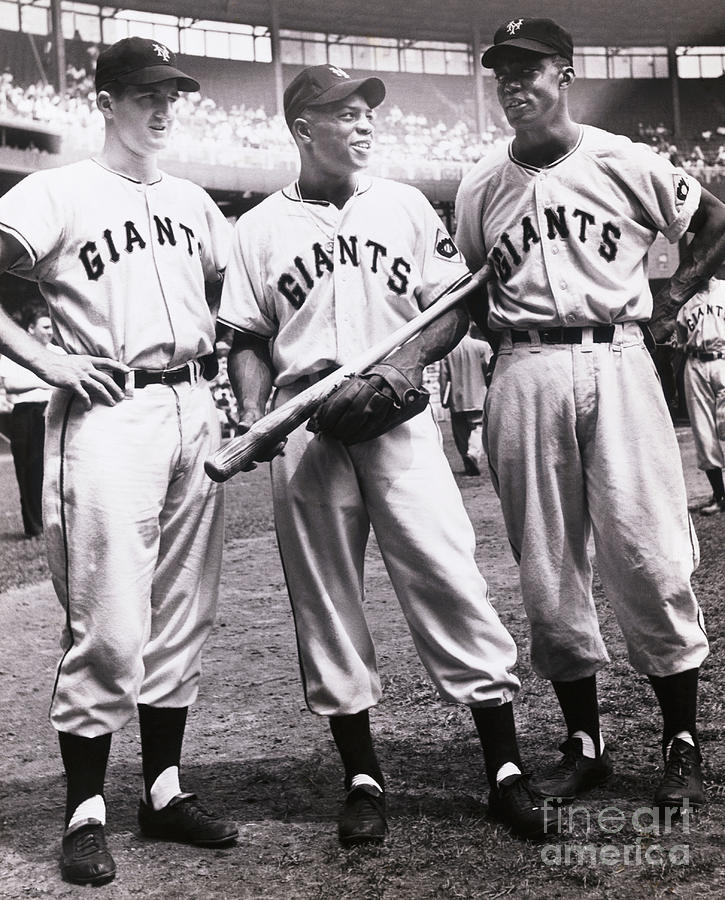 Baseball Players Conversing On The Field Photograph by Bettmann