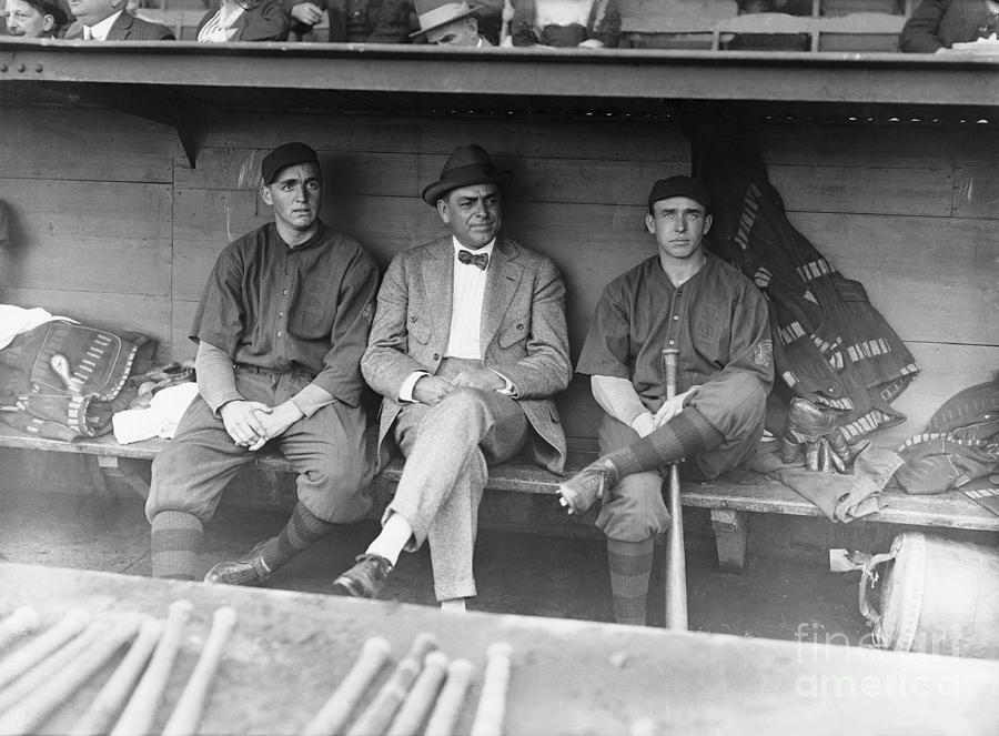 Baseball Players In Dugout Photograph by Bettmann