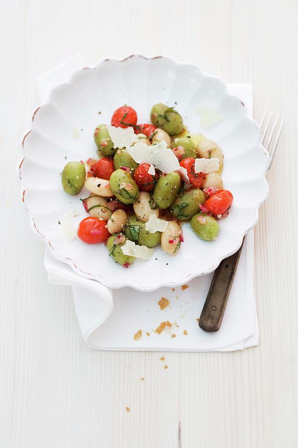 Basil Gnocchi With Cherry Tomatoes And White Beans Photograph by Michael Wissing