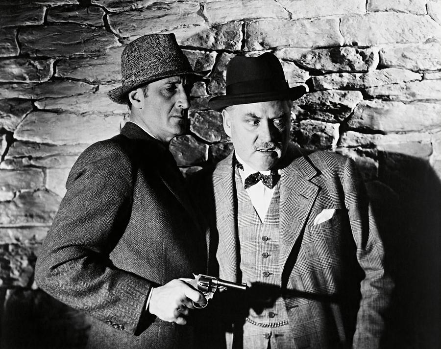 Sherlock Holmes Photograph - BASIL RATHBONE and NIGEL BRUCE in THE PEARL OF DEATH -1944-. by Album