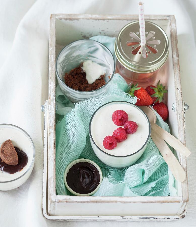 Basket-crate With Verrines ;blancmange With Raspberries, Chocolate Ganache With Chocolate Biscuit Crumbs, Strawberry Syrup Photograph by Garnier
