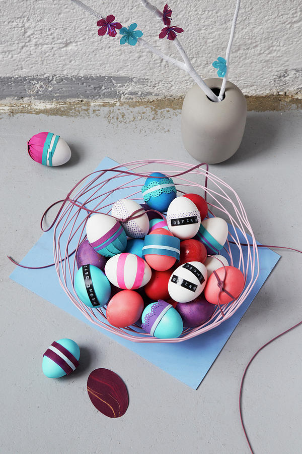 Basket Of Easter Eggs And Branches Decorated With Paper Flowers In Vase Photograph by Heidi Frhlich
