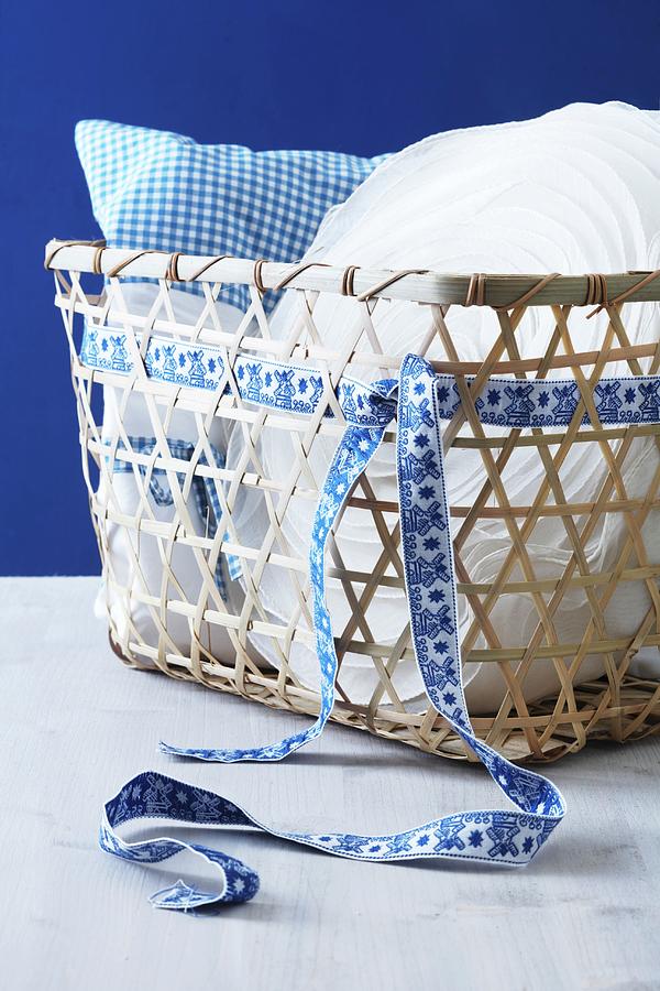 Basket With A Pillow And A Ribbon Photograph by Franziska Taube