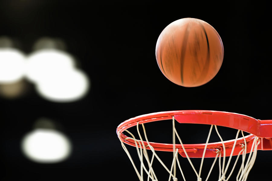 Basketball Above Basket by David Madison