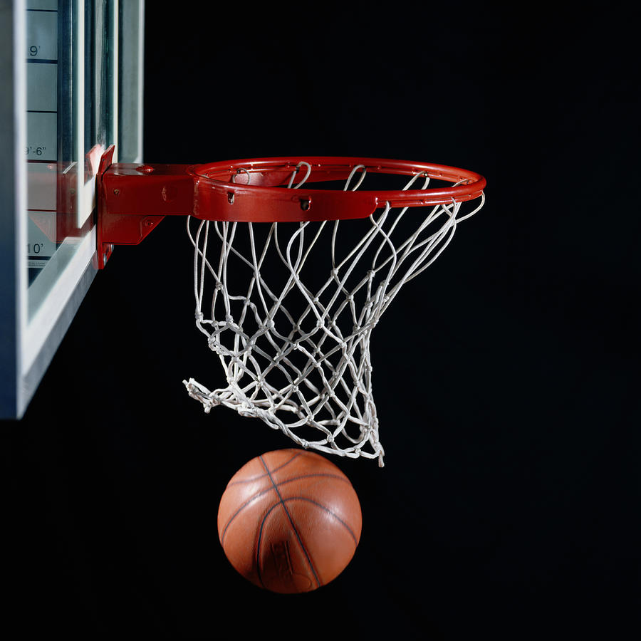 Basketball In Hoop Photograph by Ryan Mcvay