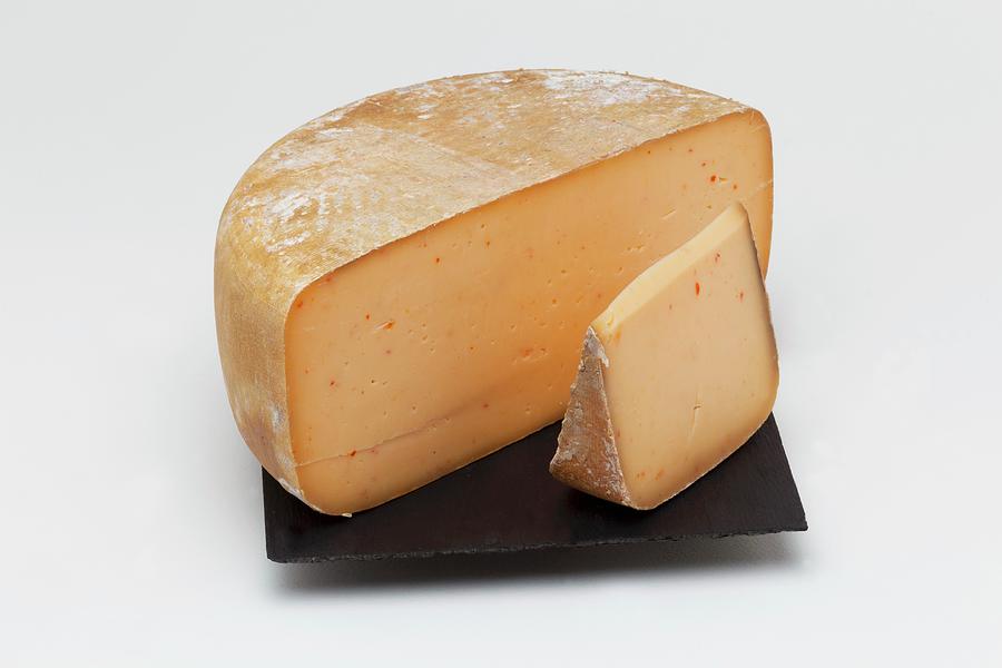 Basque Cheese With Piment Despellette Photograph by Jean-marc Blache