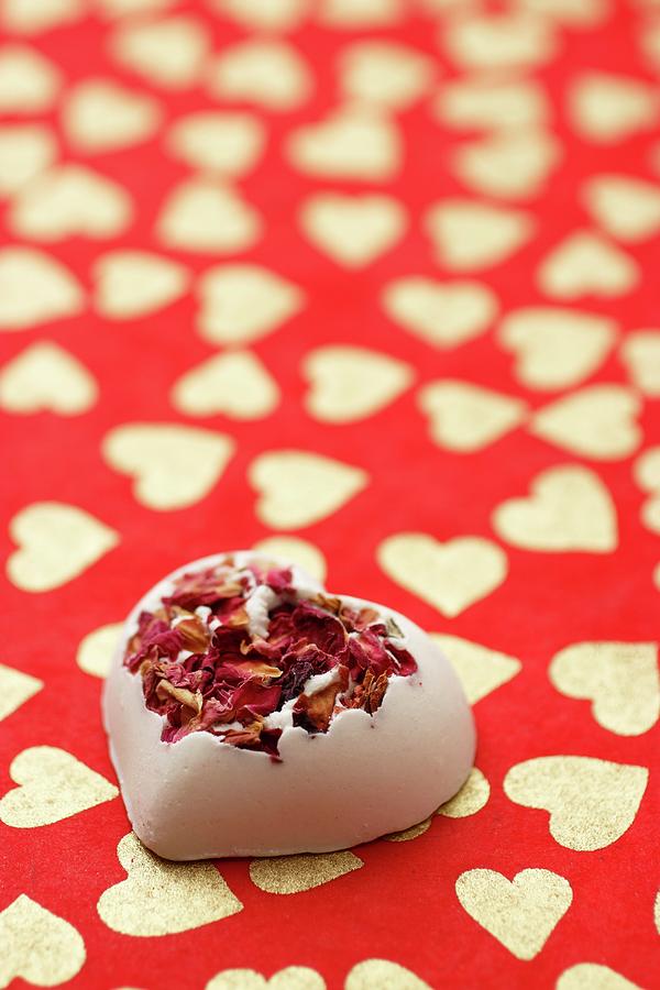 Bath Bomb With Rose Petals On A Red Background Patterned With Hearts Photograph by Gross, Petr