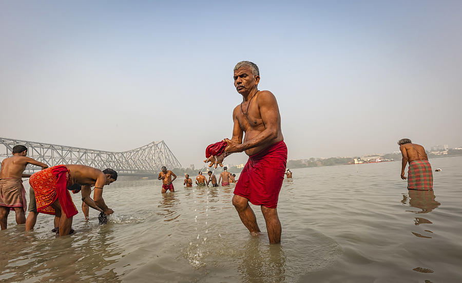 Bathing In Hooghly River Photograph by Souvik Banerjee