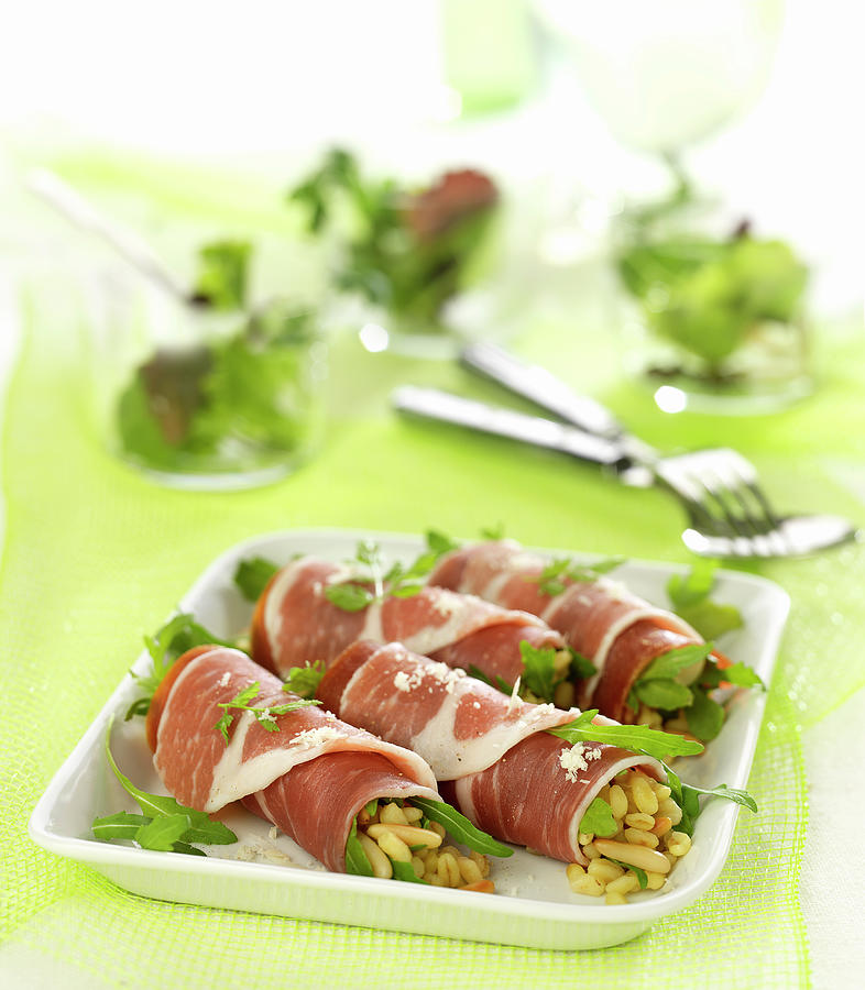 Bayonne Raw Ham Rolls Garnished With Wheat Risotto With Rocket Lettuce ...