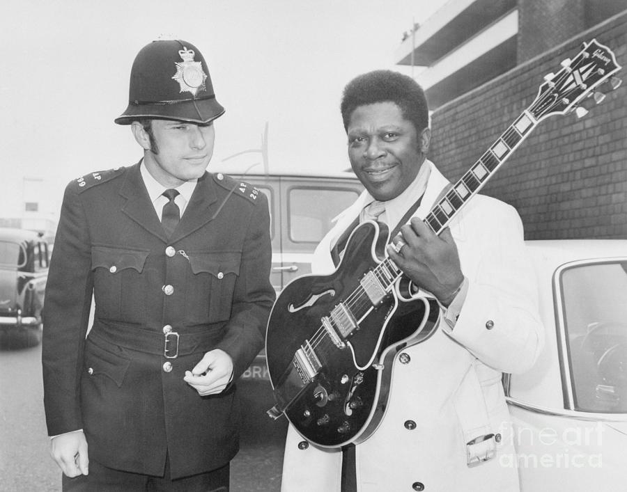 B.b. King Posing With Policeman Photograph by Bettmann