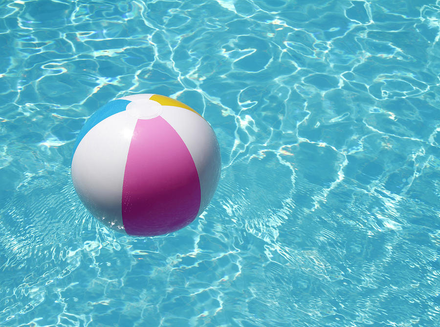 Beach Ball In Swimming Pool Photograph by Tom And Steve