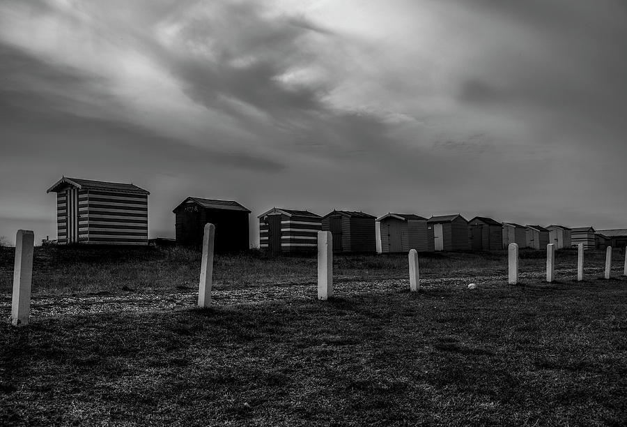 Black And White Photograph - Beach Huts by Claire Doherty