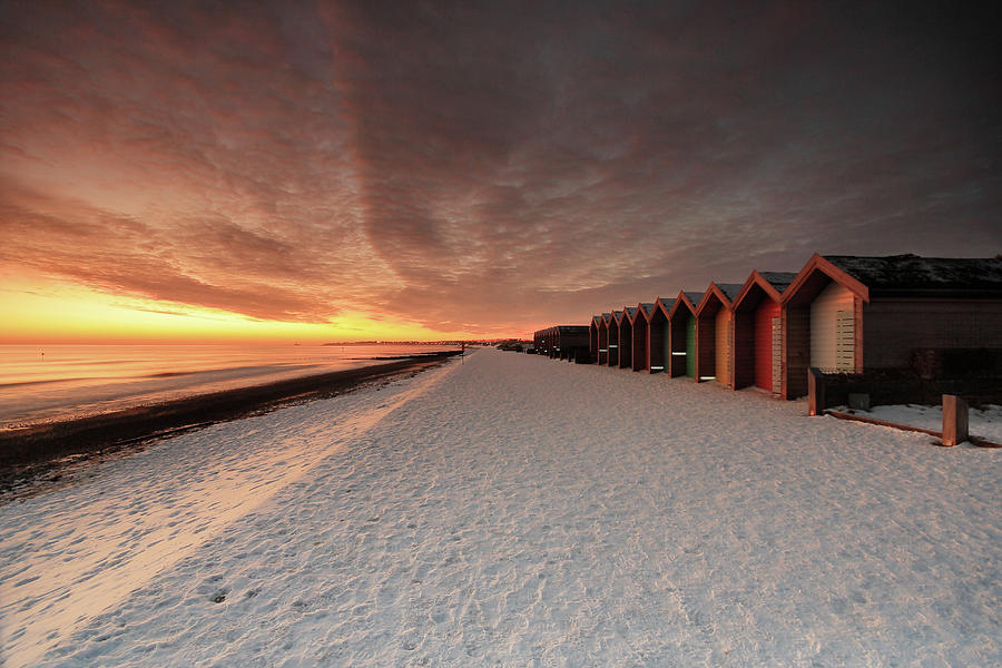 Beach Huts In Snow At Blyth Photograph by Tom Hill