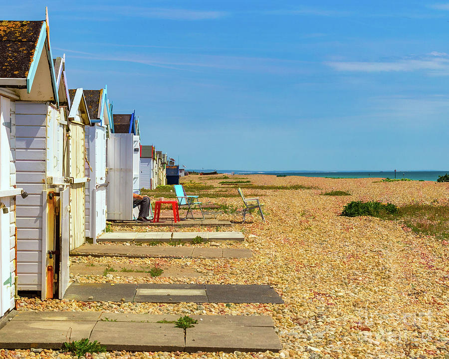 Beach Huts on Worthing Beach Photograph by Roslyn Wilkins