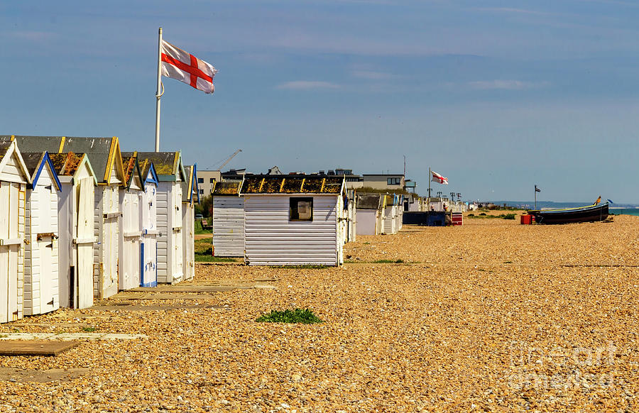 Beach Huts with Flags Photograph by Roslyn Wilkins
