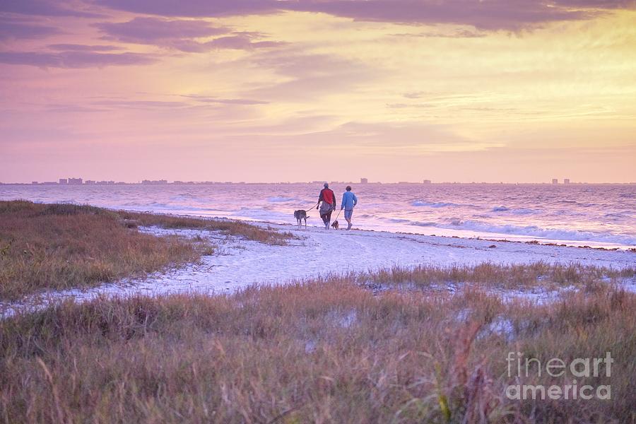 Sunrise Stroll on the Beach Photograph by Susan Rydberg