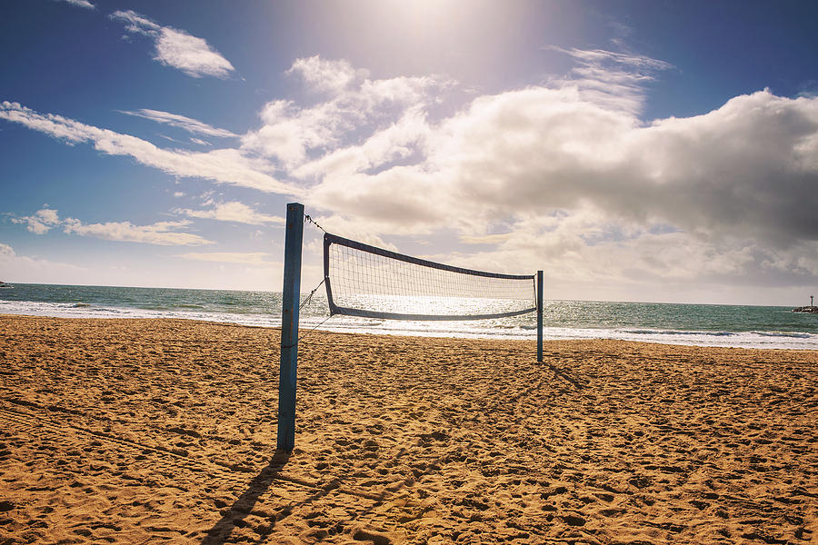 Beach volleyball net on the Corona del Mar State Beach near Los Angeles by  Miroslav Liska