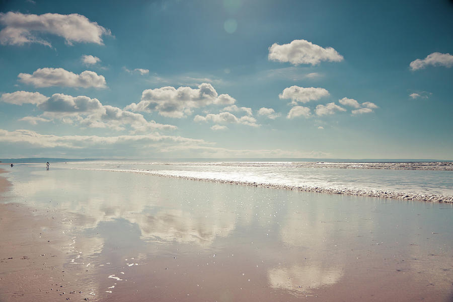 Beach With Cloud Reflections And Blue Photograph by Www.zoepower.co.uk