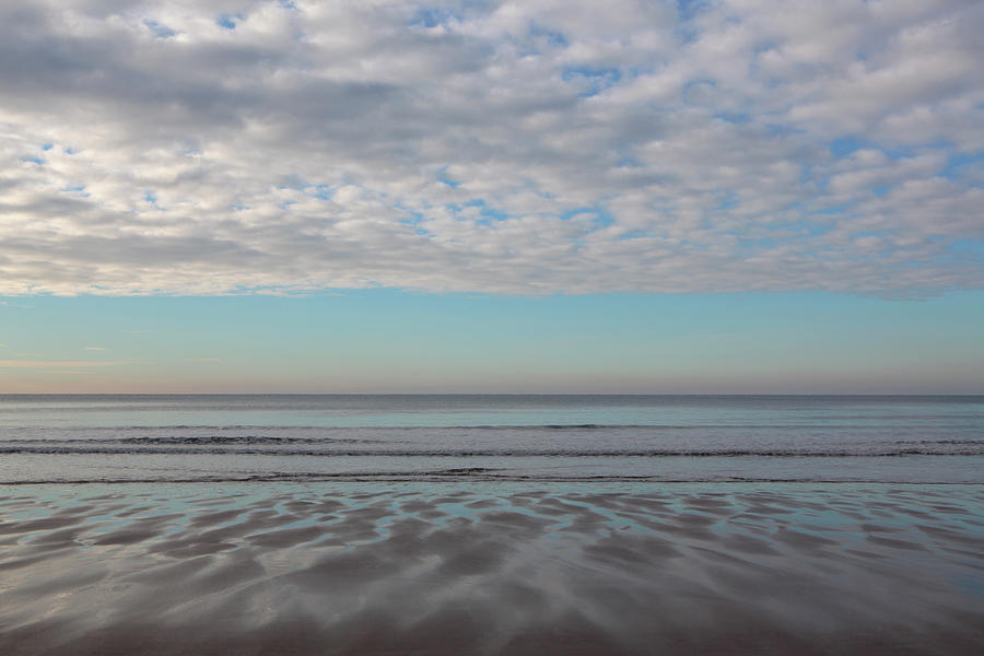 Beach With Reflection Of Sky In Sand By Peter Cade