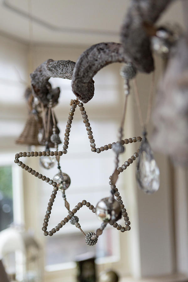 Bead Star And Garland Of Vintage-style Christmas Decorations Photograph by Studio Lumino