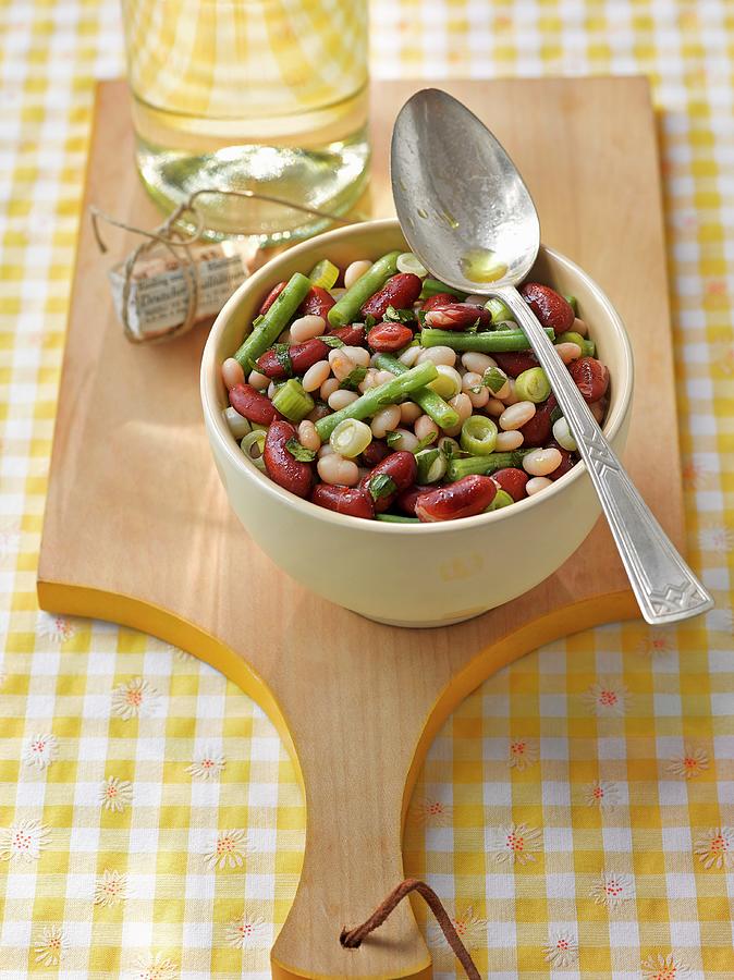 Bean Salad In A Bowl On A Wooden Board Photograph by Thorsten Strmer