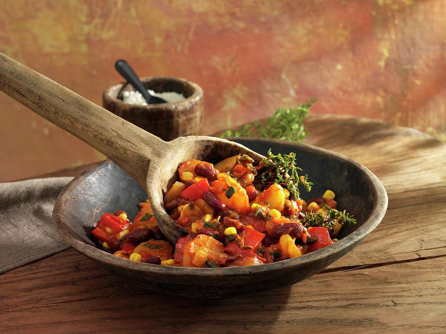 New Orleans Photograph - Bean Stew With Kidney Beans, Peppers And Sweetcorn In A Wooden Bowl by Newedel, Karl