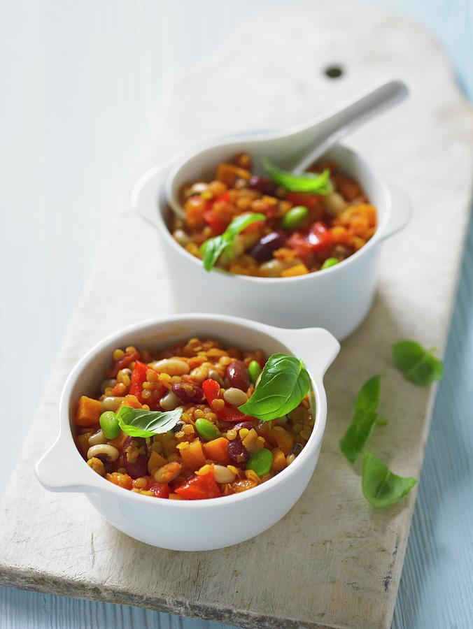 Bean Stew With Tomatoes And Basil Photograph by Clive Streeter