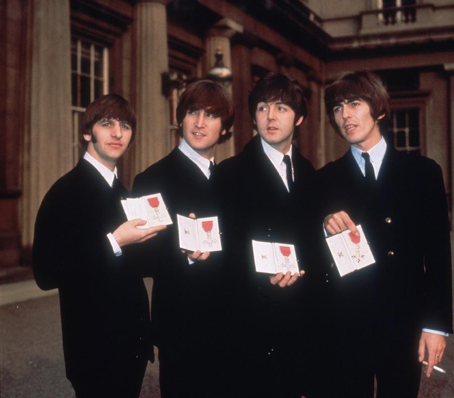 Beatles At Buckingham Palace Photograph by Hulton Archive