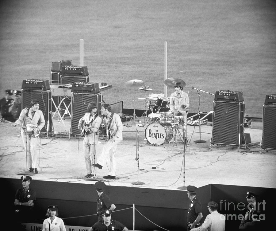 Beatles Performing At Shea Stadium Photograph by Bettmann