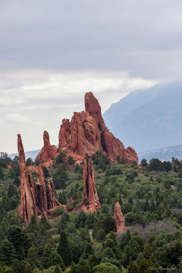 Beautiful red rock spires reaching for the sky. by Timothy Pinckard Beautiful red rock spires reaching for the sky. by Timothy Pinckard
