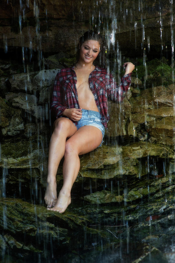 Beautiful woman behind a waterfall Photograph by Dan Friend