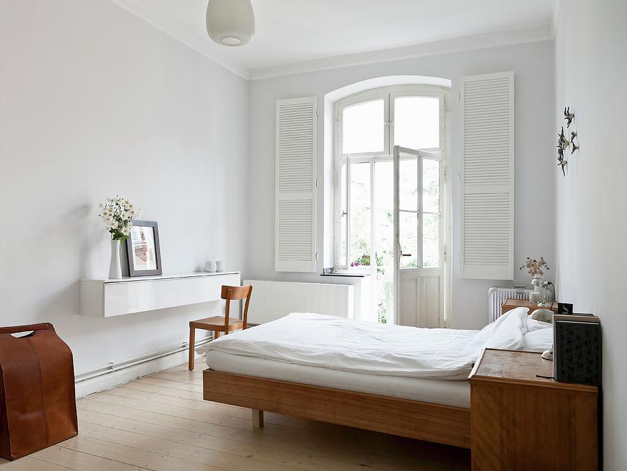 Bed With Simple Wooden Frame, Wooden Bedside Cabinet, White Floating ...