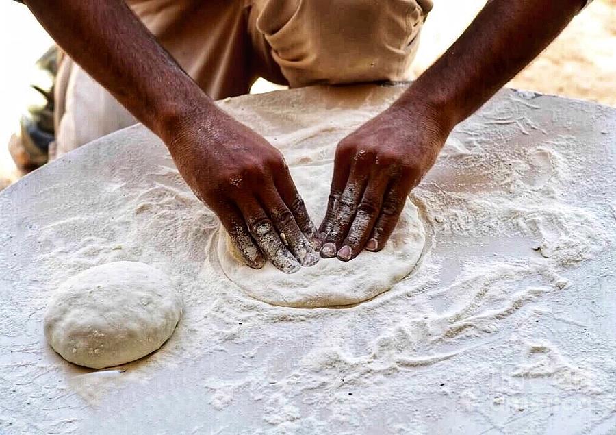 Bedouin baking Pita Bread, Israel Photograph by Jody Frankel