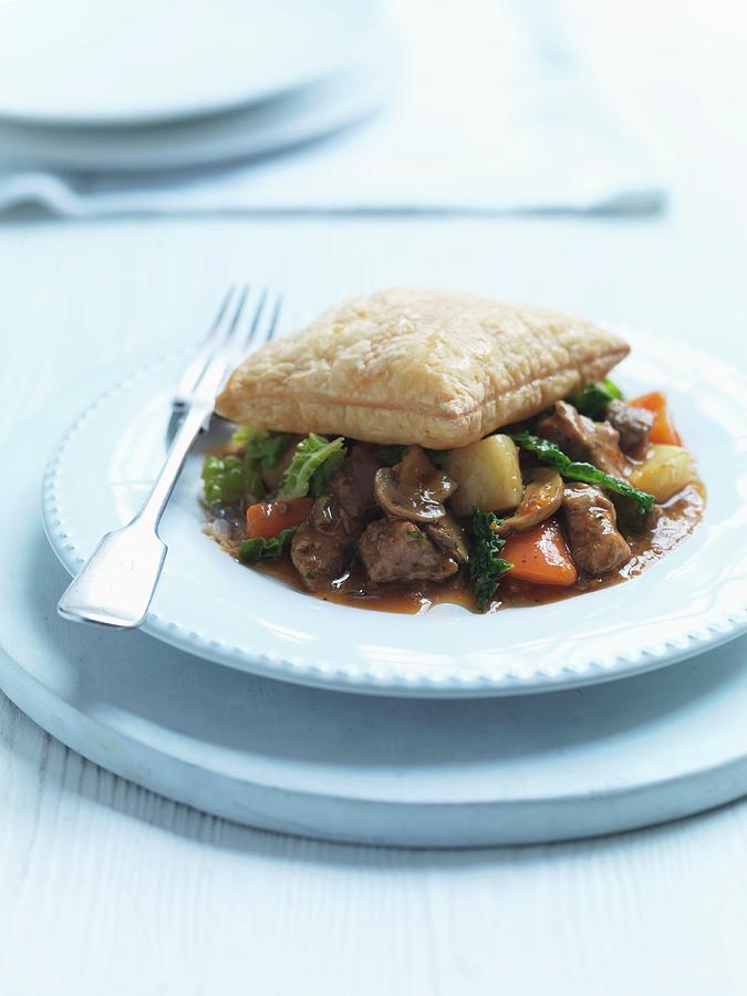 Beef And Ale Pie Photograph by Jonathan Gregson