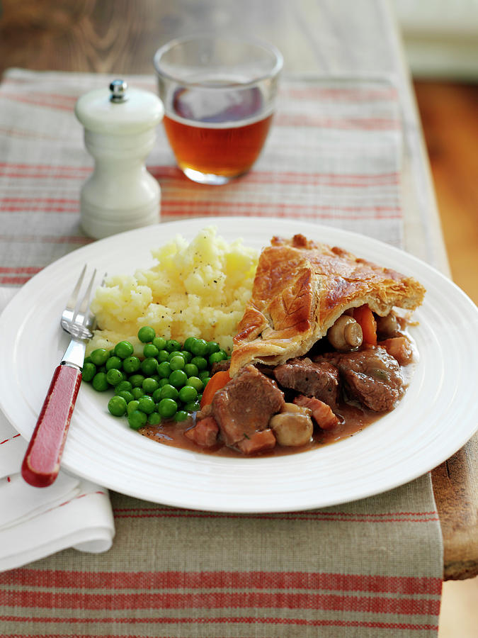 Beef And Ale Pie With Mashed Potatoes And Peas england Photograph by Gareth Morgans