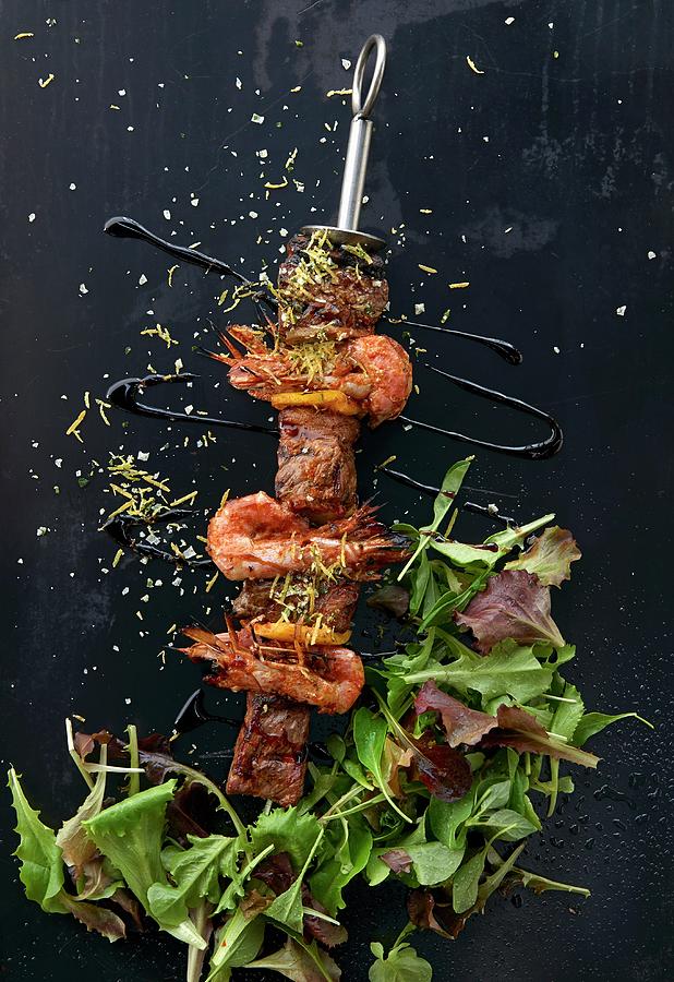 Beef And Prawns Skewers With Salad Photograph by Robbert Koene