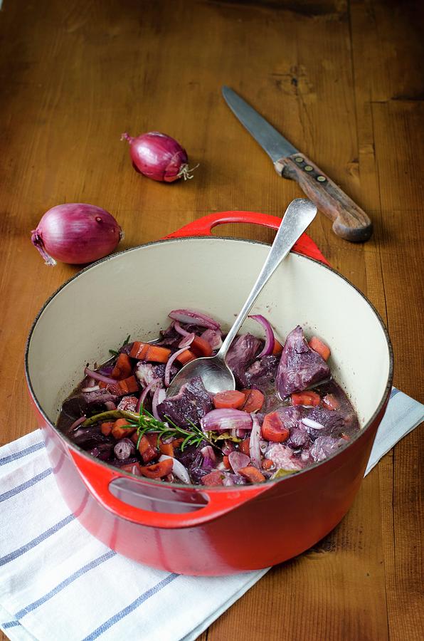 Beef Being Marinated In Red Wine To Make Boeuf Bourguignon Photograph
