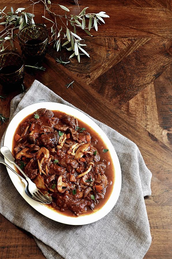 Beef Braised In Red Wine With Porcini Mushrooms Photograph by Great Stock!