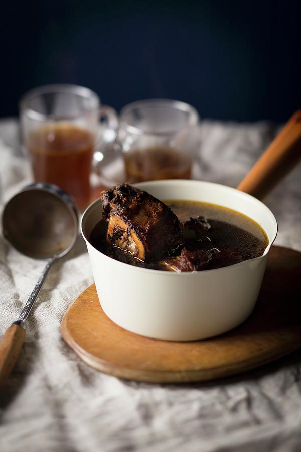 Beef Broth With Bones In A Saucepan Photograph by Great Stock!