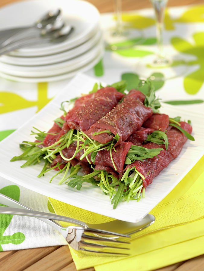 Beef Carpaccio And Rocket Rolls Photograph by Rivire