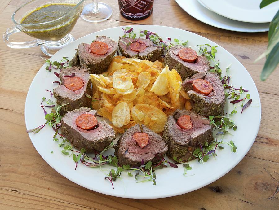 Beef Fillet Filled With Chorizo And A Herb Crust Served With Homemade Potato Crisps Photograph by Great Stock!