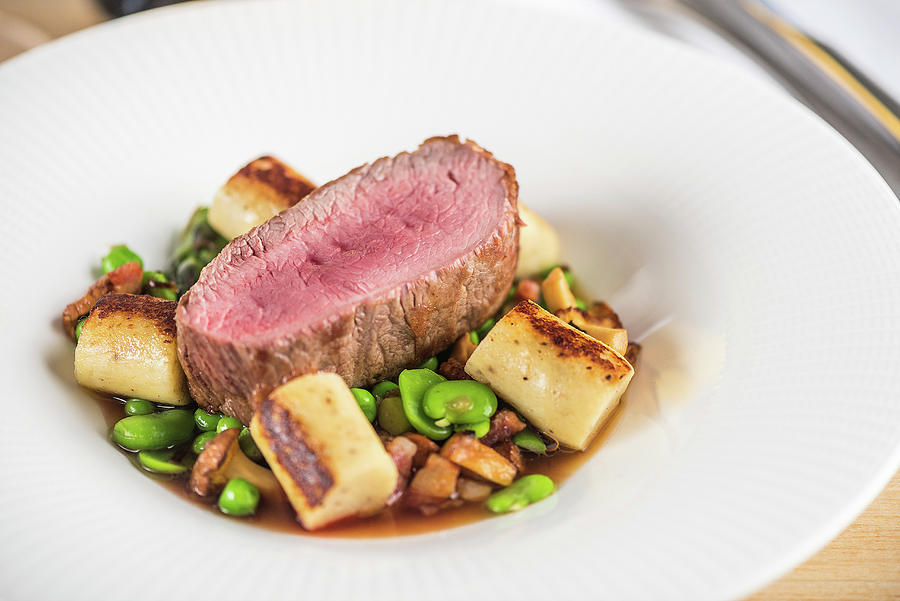 Beef Fillet With Beans And Chanterelle Mushrooms Photograph by Russel Brown