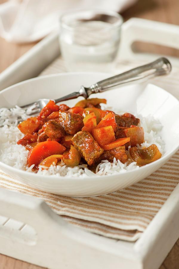 Beef Goulash On A Bed Of Rice Photograph by Jonathan Short